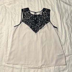 White Sleeveless Blouse with Black Lace Detailing